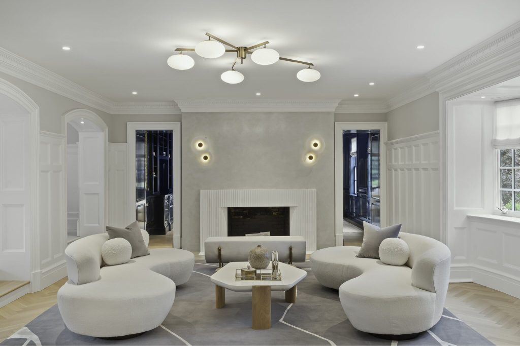An interior shot of a beautiful lounge with cream furniture